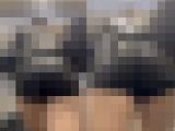 レザーショートパンツ姿が魅力的な美女